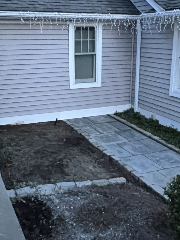 Custom lawn mowing service for homes in Warwick, RI by Mattzer Landscaping