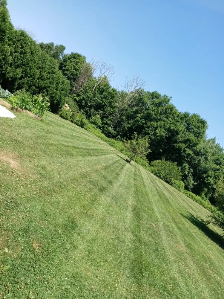 Professional lawn mowing service with custom design in Somers, CT by Maturo Lawn & Landscape