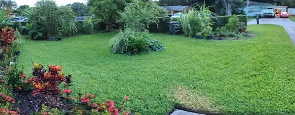 Maurice Castin Lawn Care Logo