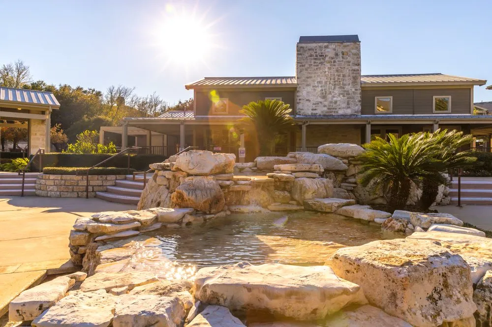 Custom outdoor landscaping in Bellville, TX by Maven Landscapes