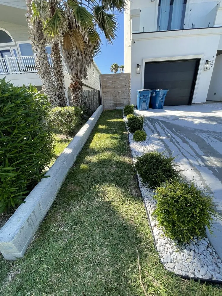 Custom landscape installation for outdoor upgrades in Port Isabel, TX by Max Cantu’s Green And Clean Lawn Services