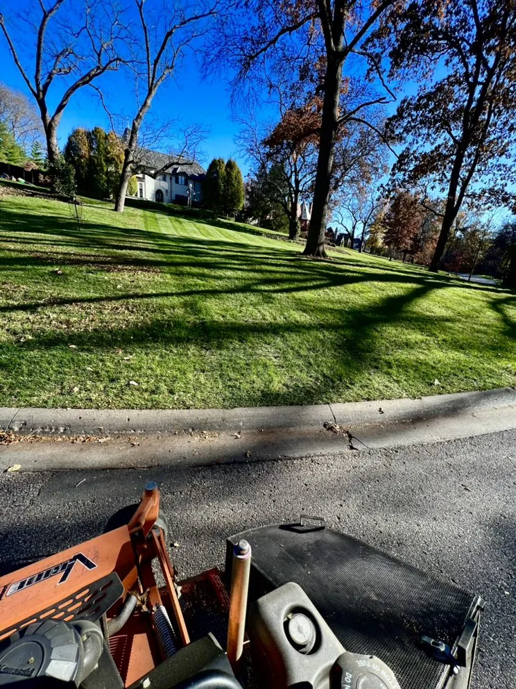 Professional lawn mowing service for residential properties across Independence, MO - Max Lawn and Landscape