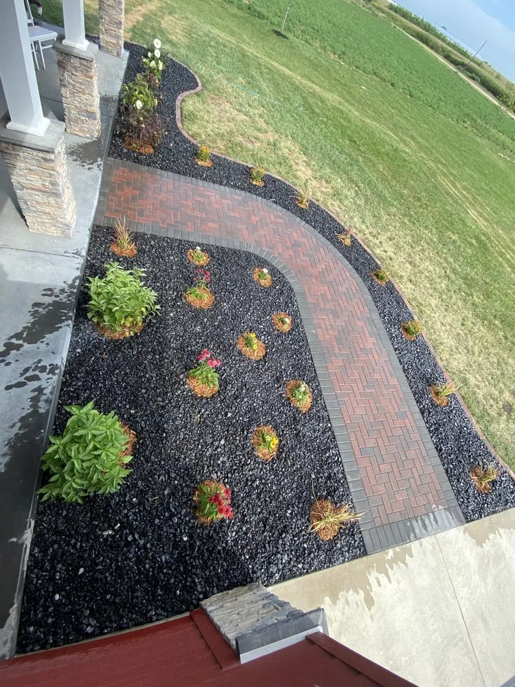 Custom garden landscaping for residential properties in Sterling, NE by Maximum Landscaping & Design