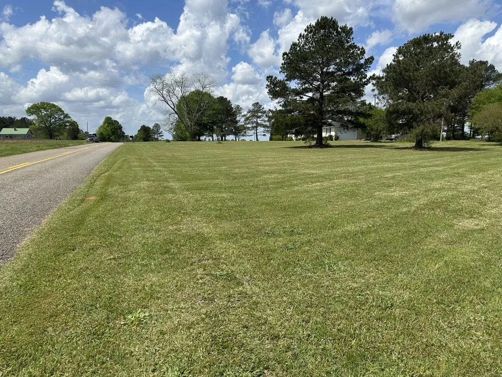 Local lawn mowing service for year-round maintenance across Cochran, GA - Maxscapes landscaping