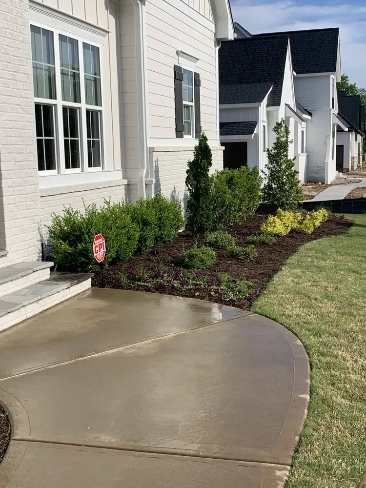 Affordable lawn care service for beautiful yards in Elon, NC by May Farm Enterprises