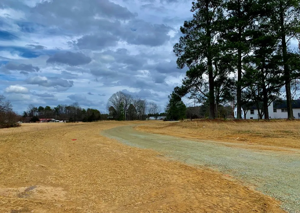 Reliable lawn care service for homes across Elon, NC - May Farm Enterprises