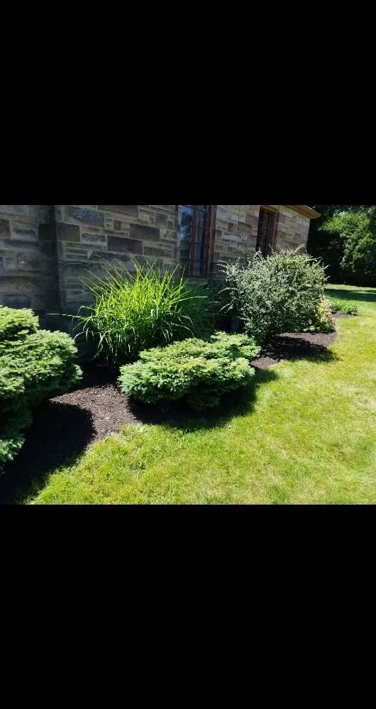 Custom residential landscaping for beautiful yards across North Canton, OH - May I Help You? Landscapes & Lawn Care