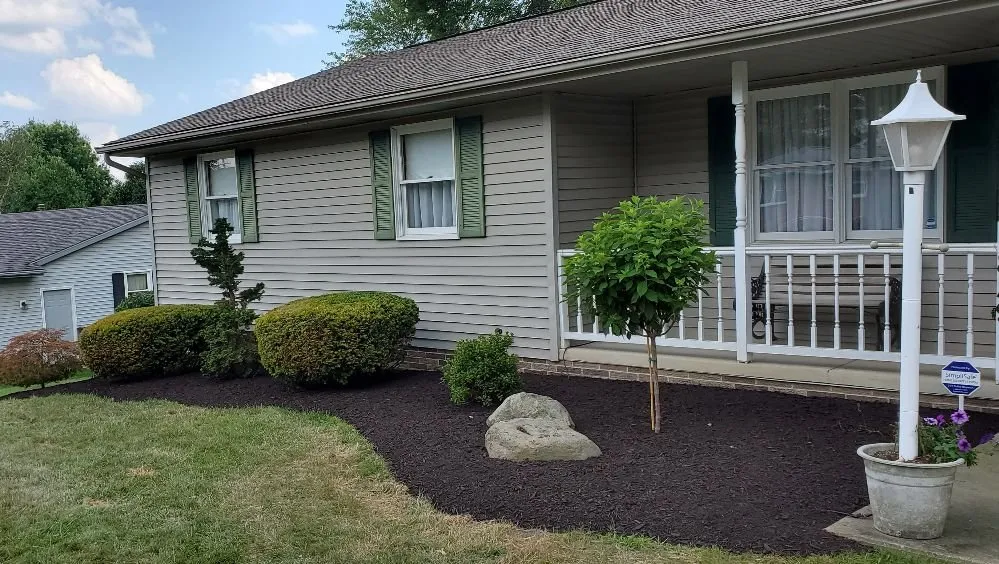 Professional lawn mowing service experts serving North Canton, OH - May I Help You? Landscapes & Lawn Care