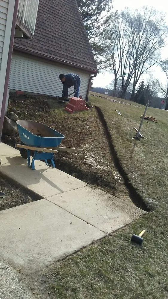 Custom landscape installation in Beloit, WI by Maya-Bruns Landscaping