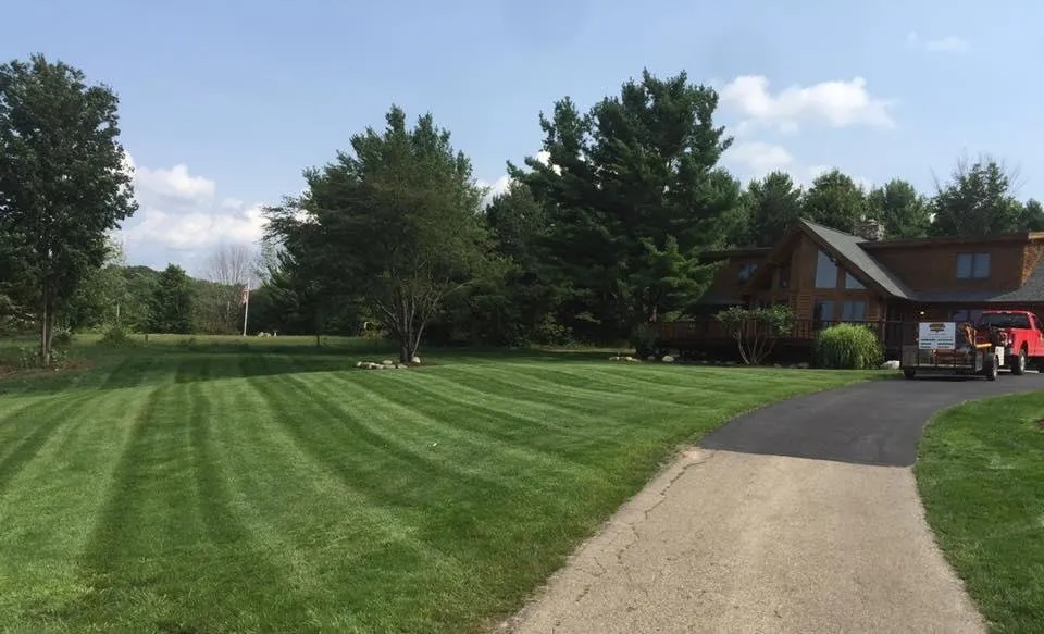 Top-rated lawn mowing service near you in Traverse City, MI by Maybell Outdoors