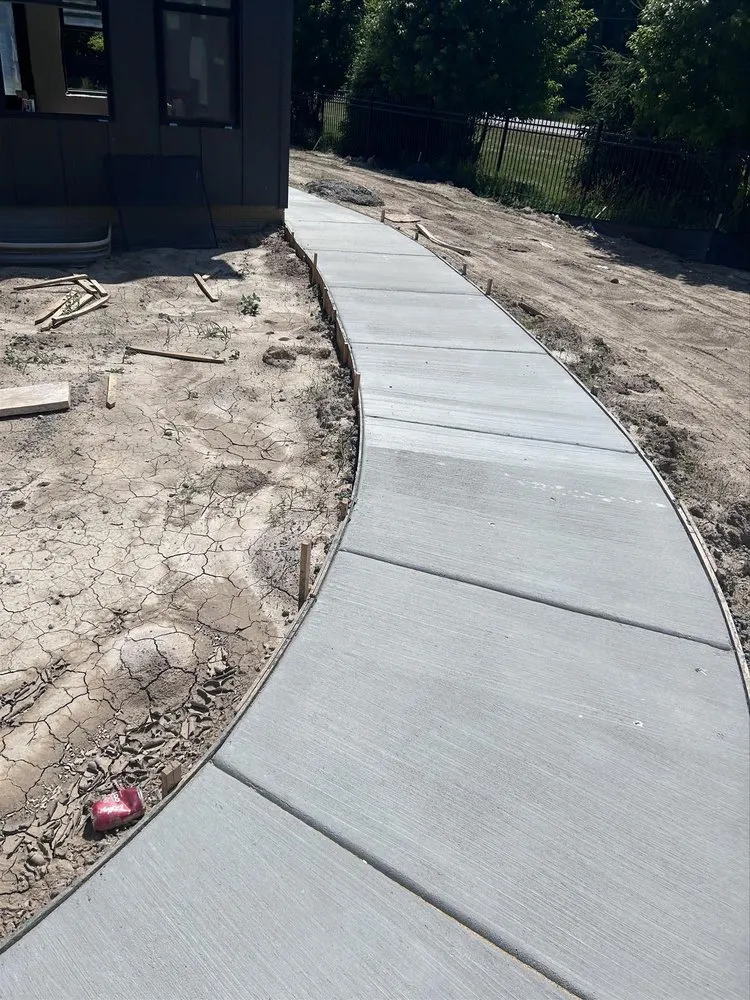 Reliable lawn care service for residential properties across Bloomington, IL - Mayo Concrete Construction