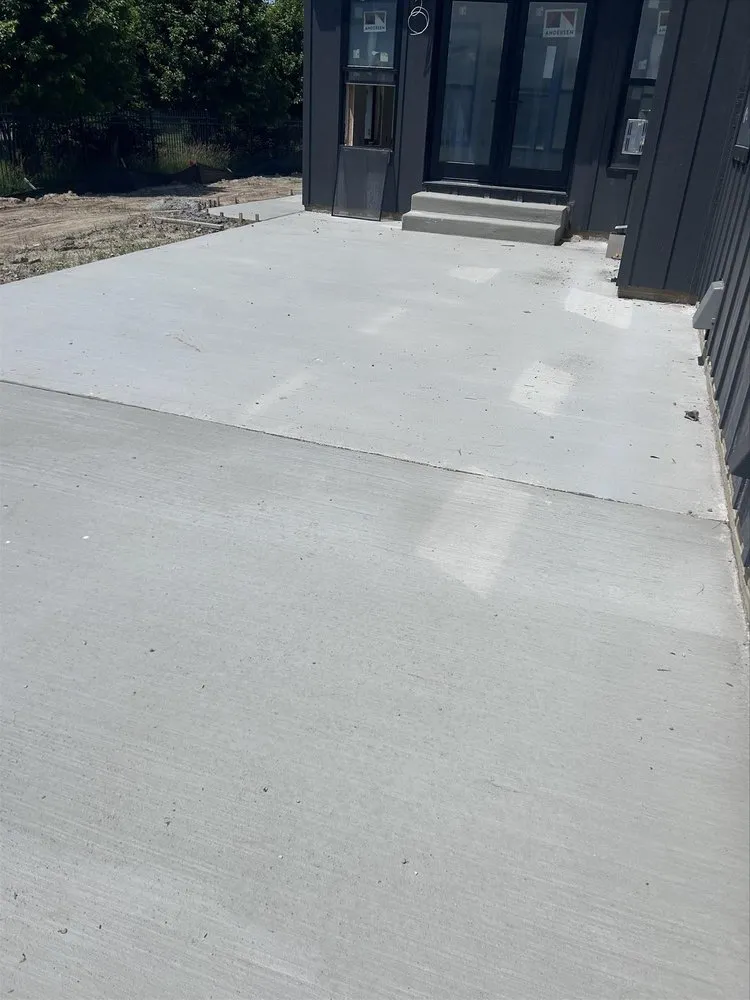 Professional landscape design for residential properties in Bloomington, IL by Mayo Concrete Construction