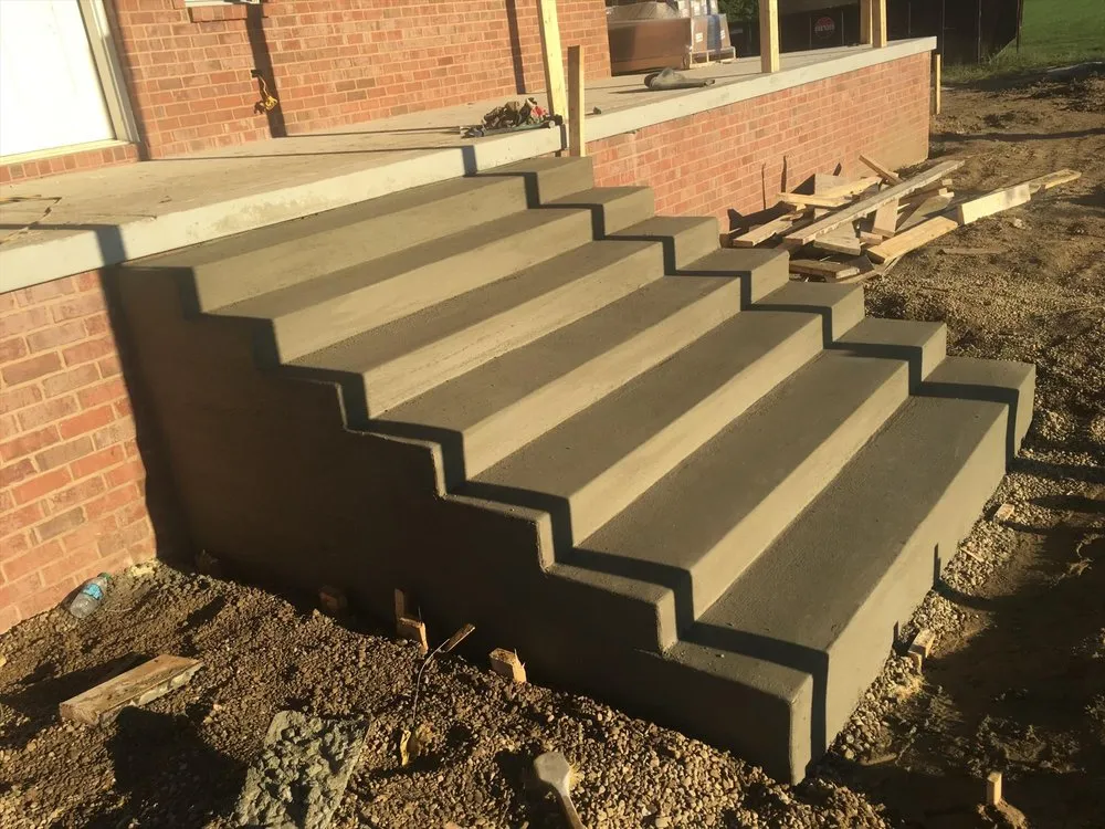 Trusted lawn mowing service for homes in Bloomington, IL by Mayo Concrete Construction