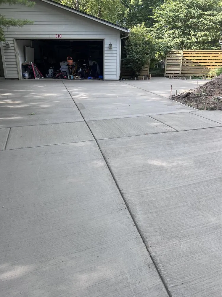 Affordable lawn mowing service for residential properties in Bloomington, IL by Mayo Concrete Construction