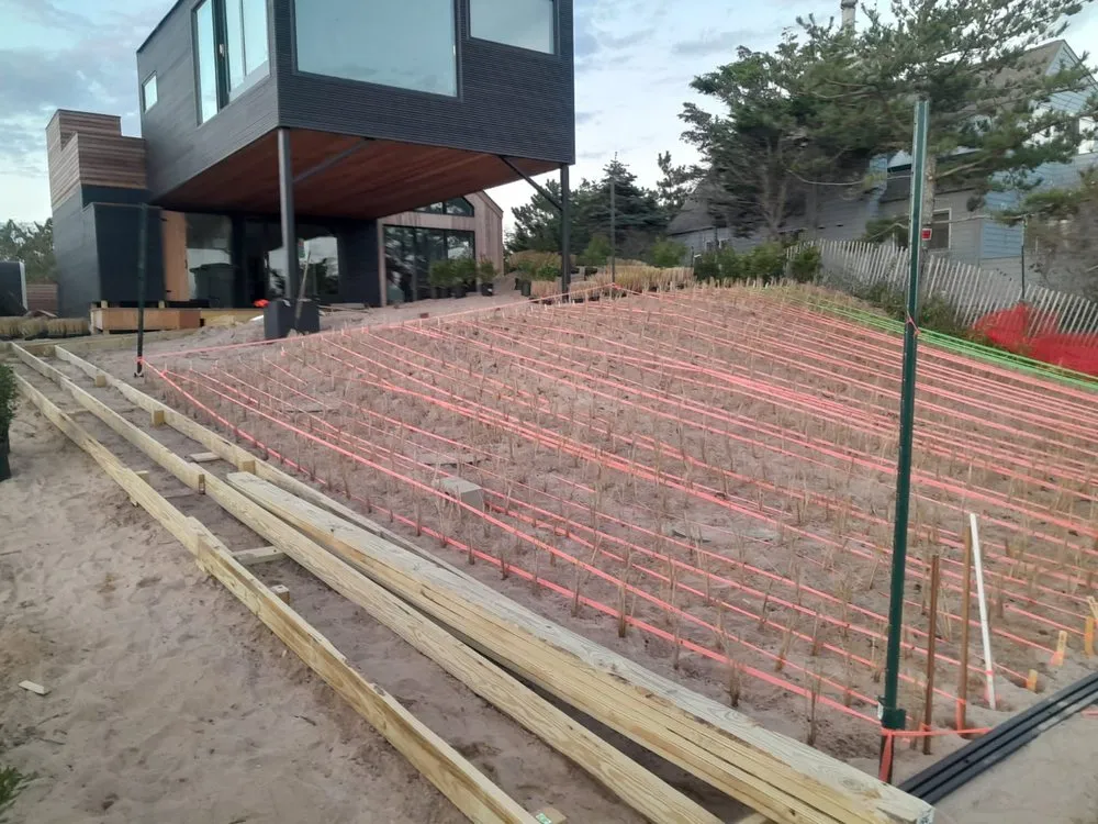 Professional lawn care service for homes in East Hampton, NY by MB Tree Service Corp