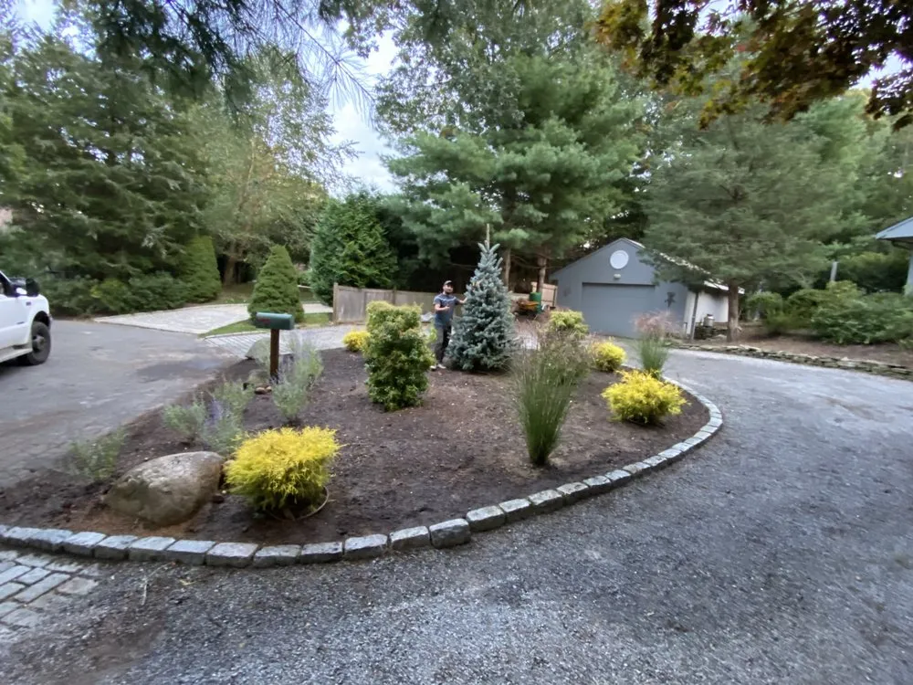 Professional yard maintenance for year-round maintenance in East Hampton, NY by MB Tree Service Corp