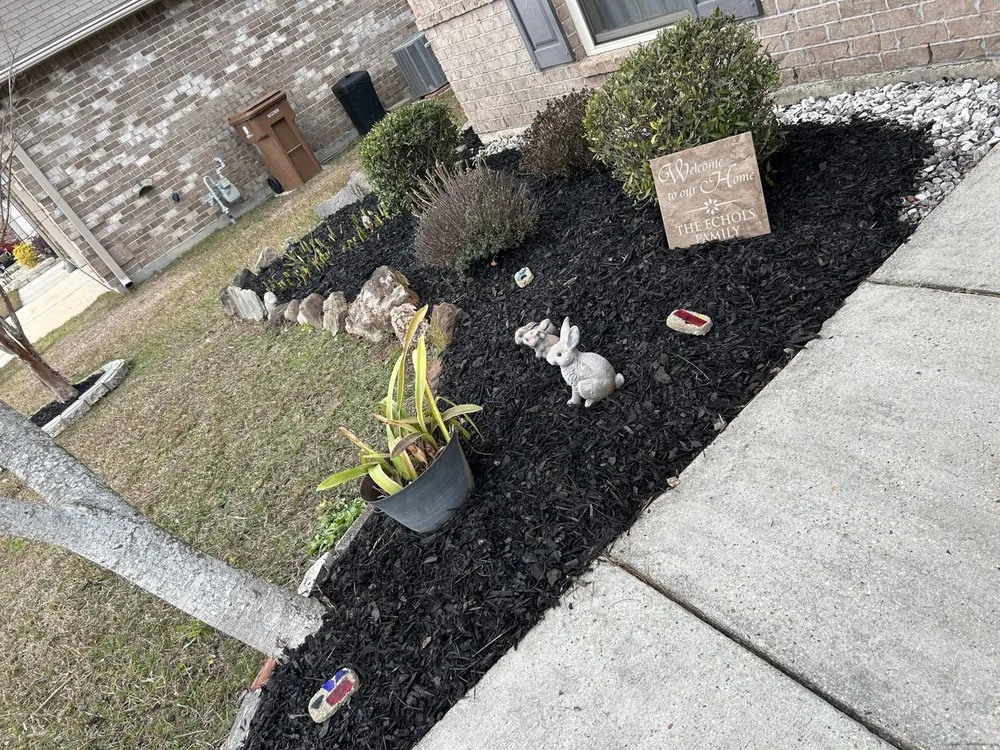 Affordable yard cleanup service with custom design in Gulfport, MS by Mc Guffey Perfektion