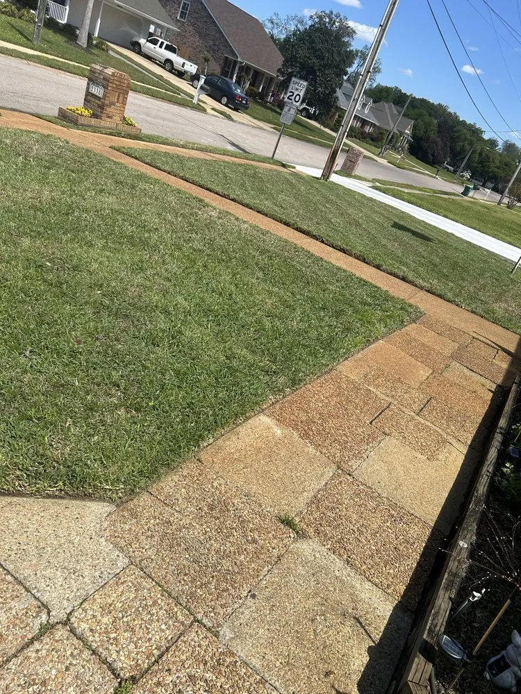Custom lawn mowing service for outdoor upgrades in Gulfport, MS by Mc Guffey Perfektion