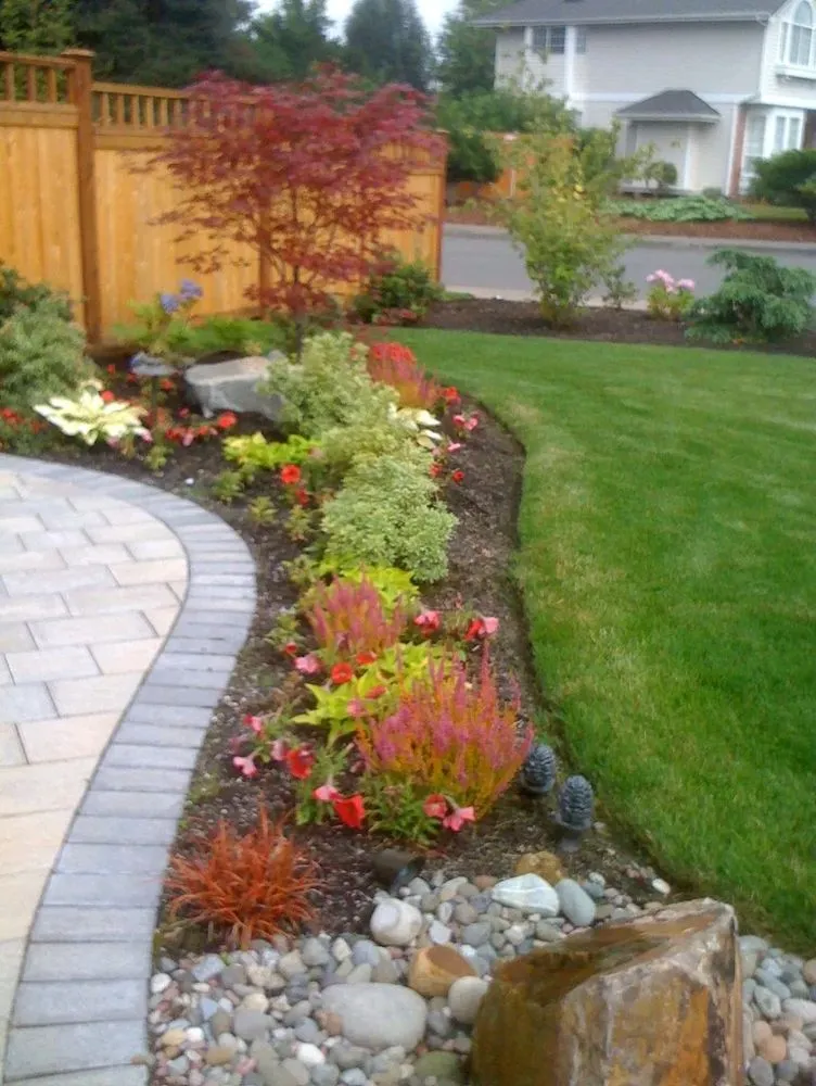 Local residential landscaping for year-round maintenance across Manchester, NH - MC Irrigation & Landscape Construction
