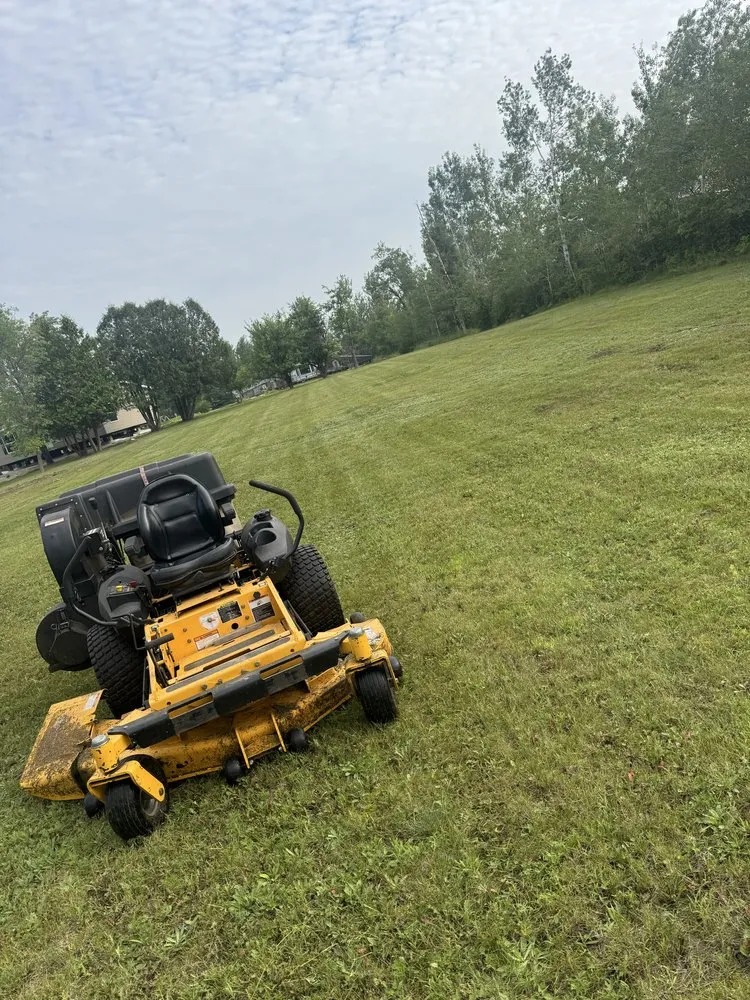 Custom lawn mowing service for homes in Bemidji, MN by MC Land Services