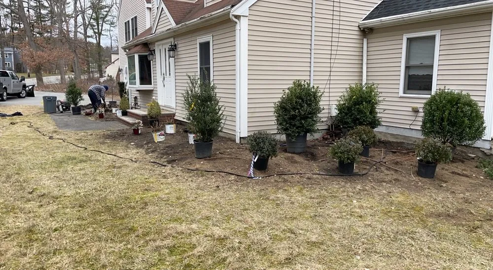 Custom lawn mowing service with custom design across Winchester, MA - MC Landscaping