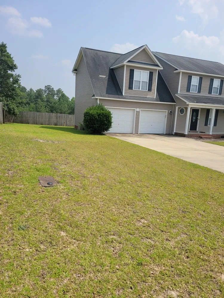 Custom garden landscaping for homes in Fayetteville, NC by M.C. lawncre/Home improvement