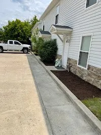 Professional lawn mowing service for residential properties in Cambridge, OH by McConkey’s Property Services