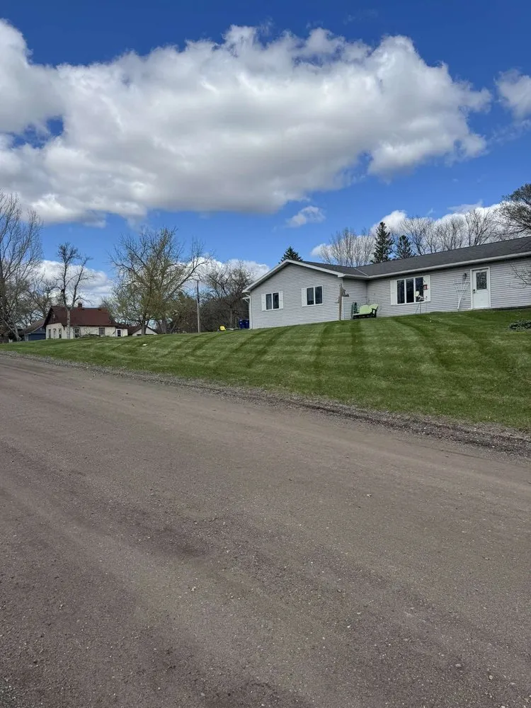 Affordable lawn mowing service in Richville, MN by McCoy's Lawn Care Service