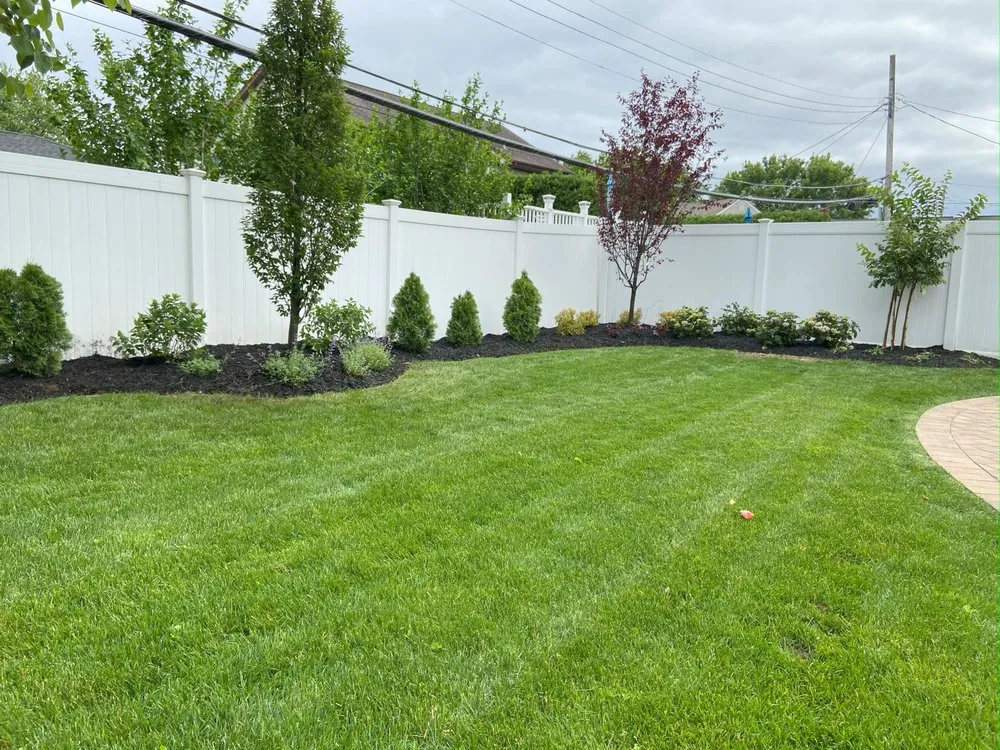 Custom outdoor landscaping in Westbury, NY by McCutchan Landscaping & Irrigation