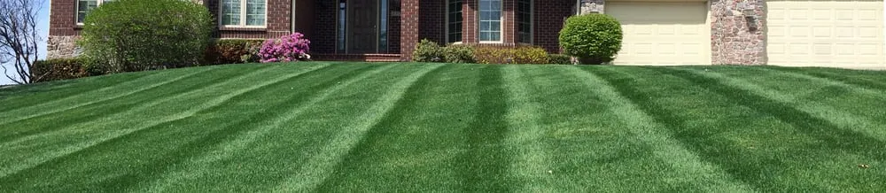 Custom residential landscaping for year-round maintenance across West Des Moines, IA - McDougal & Sons Lawn Care