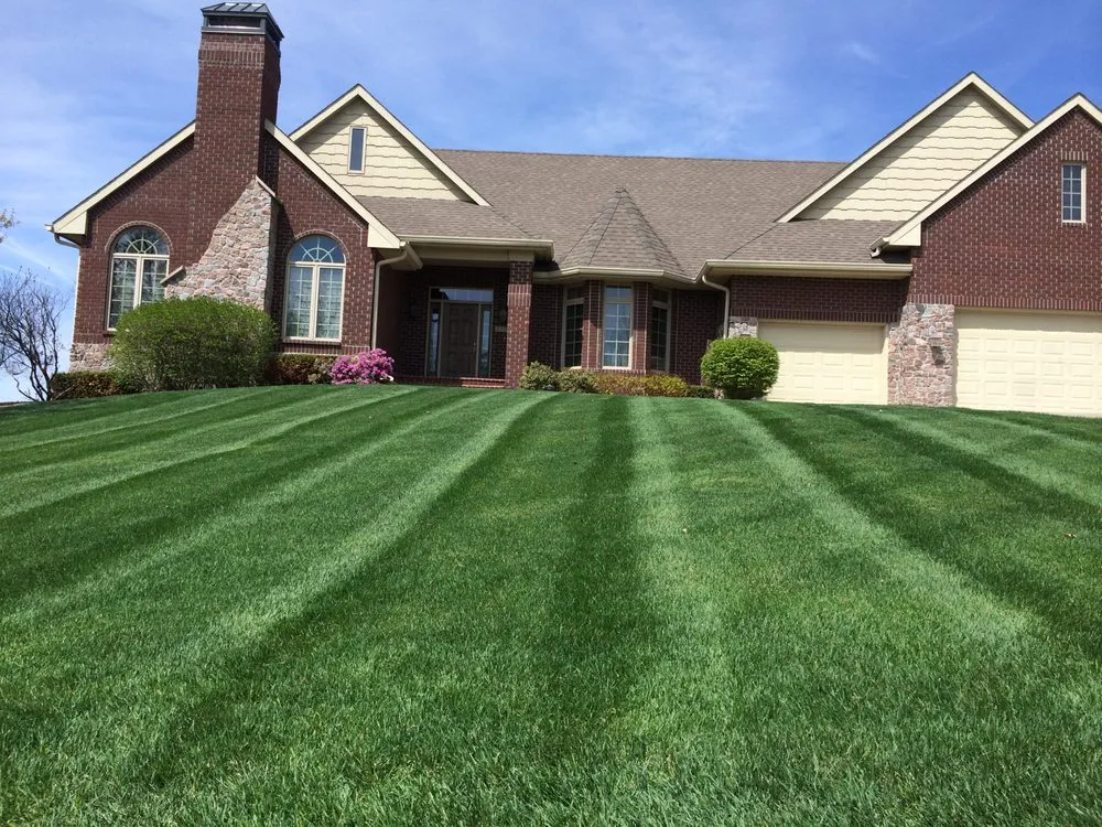 Expert yard cleanup service with custom design across West Des Moines, IA - McDougal & Sons Lawn Care