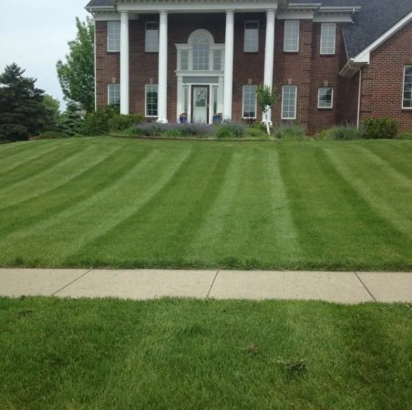 Professional lawn mowing service experts serving West Des Moines, IA - McDougal & Sons Lawn Care