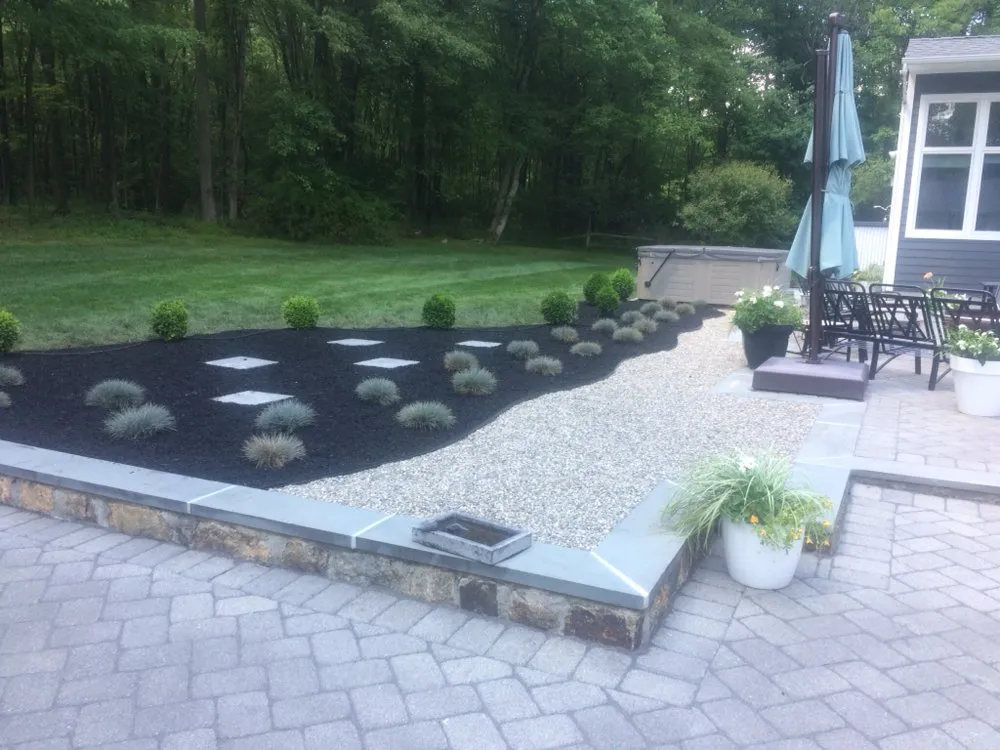 Custom lawn mowing service for year-round maintenance across Morristown, NJ - MCE Masonry & Landscaping