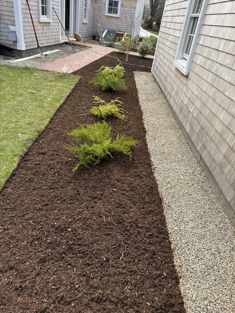 Custom lawn mowing service for year-round maintenance in Harwich, MA by McGrath Landscape Contractors