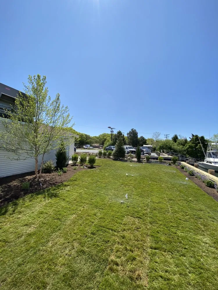 Custom landscaping services for homes in Harwich, MA by McGrath Landscape Contractors