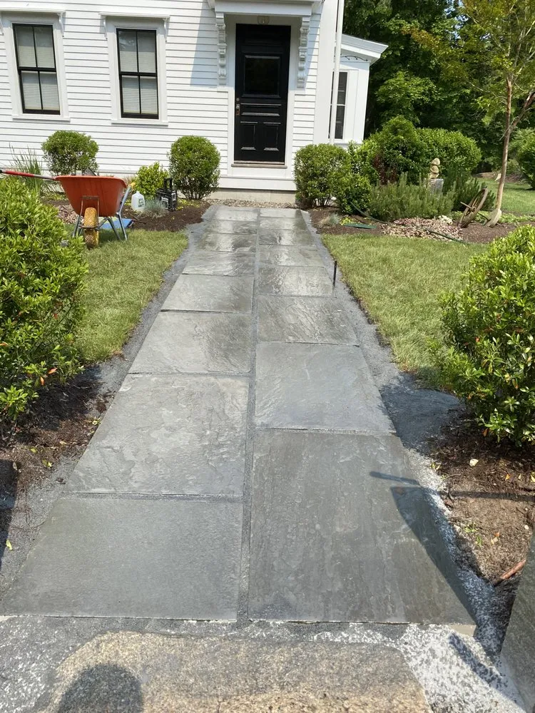 Custom landscape installation for year-round maintenance in South Yarmouth, MA by McGrath Landscape Contractors