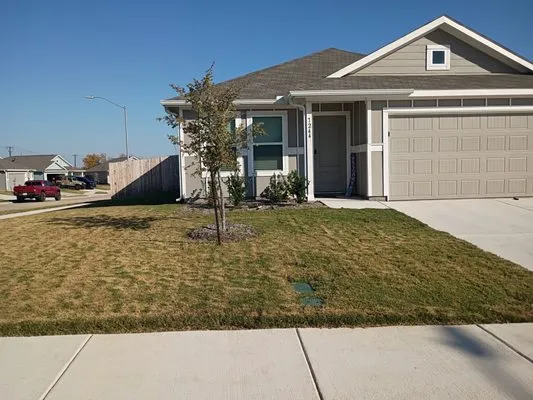 McGuire Handyman and Lawn Care Logo