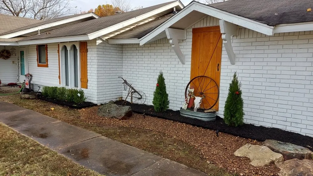 Custom landscape installation for year-round maintenance across Broken Arrow, OK - McGuire's Lawn & Landscape