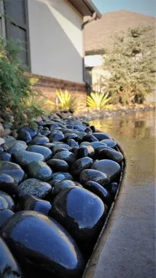 McGuire's Lawn & Landscape Logo