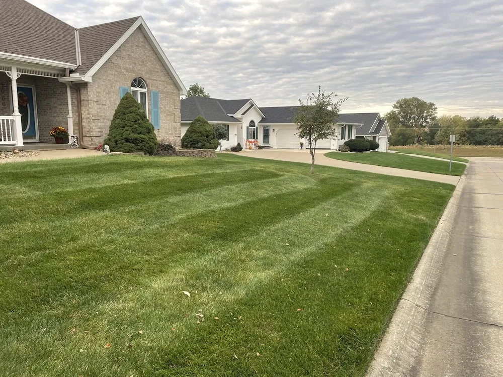 Affordable landscape design for homes in Maryville, MO by McKim Mowing