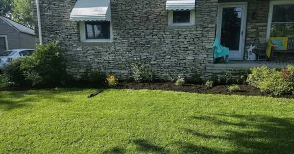 McLean Brothers Mowing and Lawn Services Logo