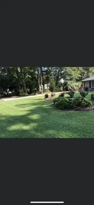 Mcleod’s lawn care Logo