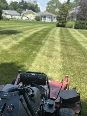 Mcmillian Lawn Service Logo