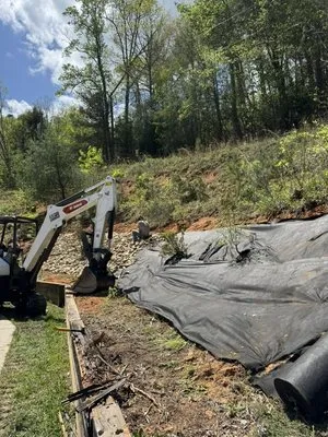 McMurray Lawncare & Landscaping Logo