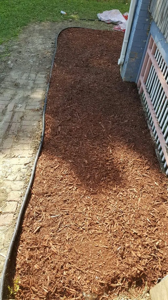 Professional garden landscaping with custom design in Davenport, IA by Mcneal's Painting & Drywalling