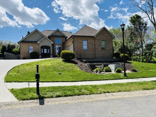 McQueen Lawn Service Logo