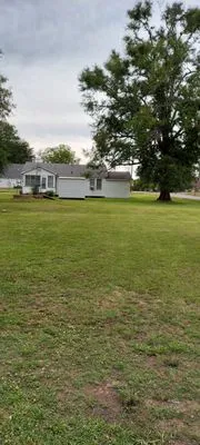 MC'S Lawn service Logo