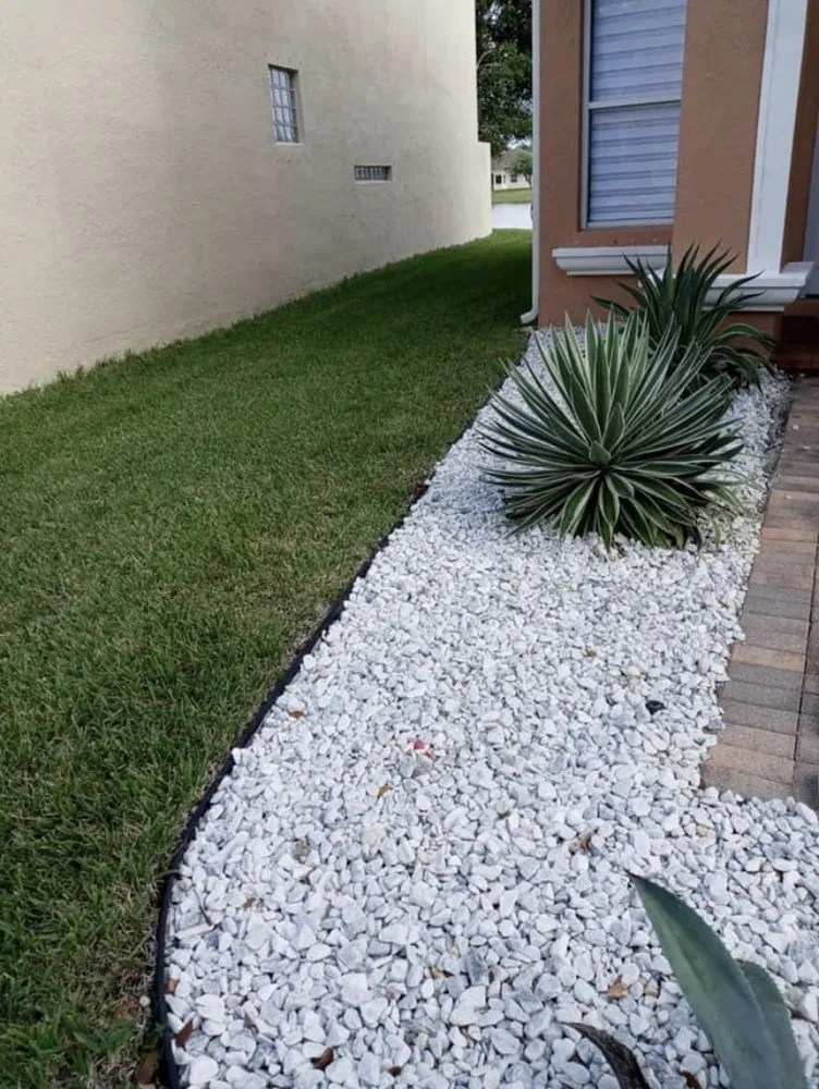 Local lawn care service for year-round maintenance in Lantana, FL by MD Green Lawn and Landscaping