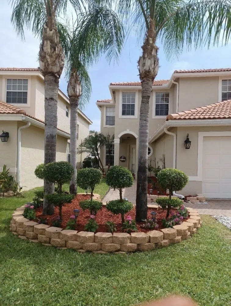 Custom outdoor landscaping with custom design in Lantana, FL by MD Green Lawn and Landscaping