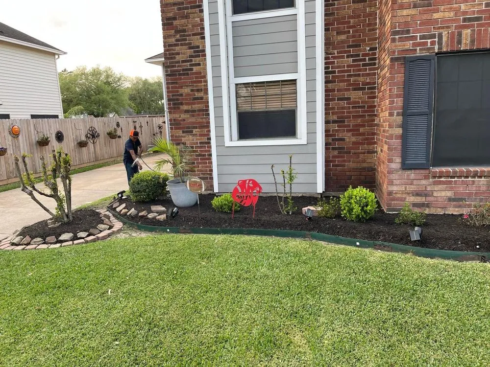 Professional landscaping services for homes in Houston, TX by MD Lawn Care Services